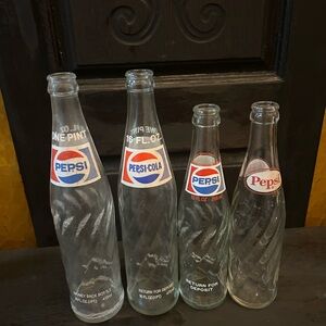 Vintage Pepsi Glass Bottles with Iconic Logos